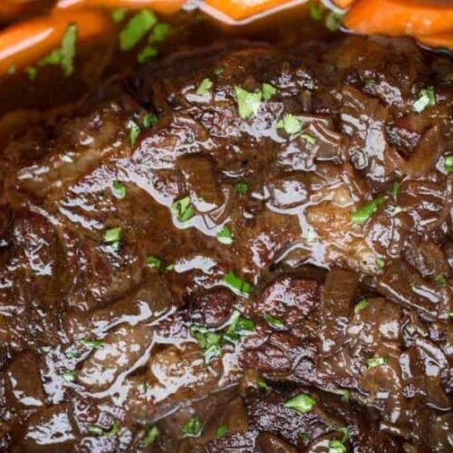 Balsamic Pot Roast in the slow cooker with carrots on the side