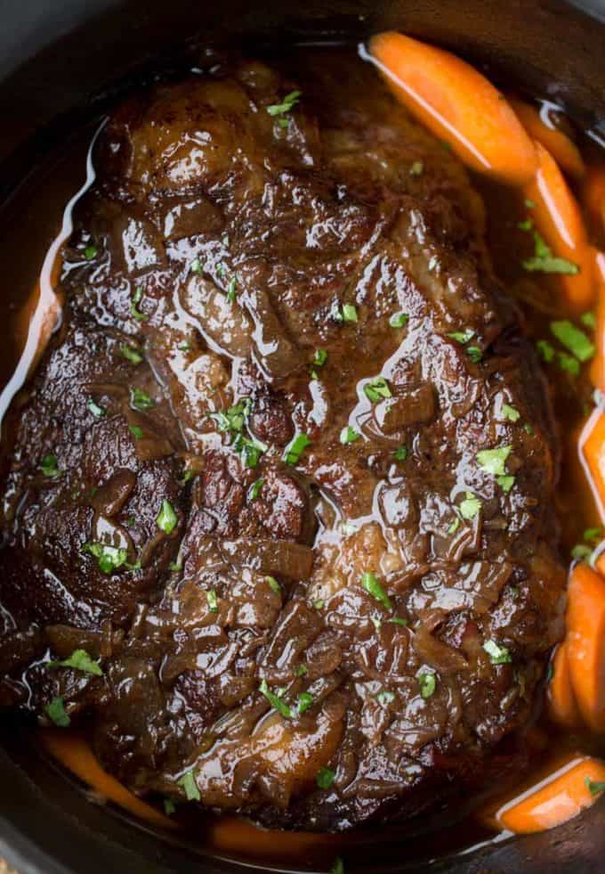 Slow Cooker Balsamic Pot Roast with a rich balsamic glaze and tender fall apart beef, you'll LOVE this whole meat in one pot!