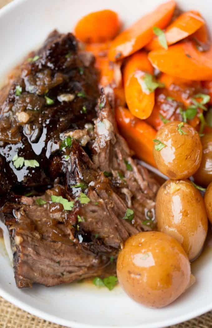 One pot meal, this Slow Cooker Balsamic Pot Roast has carrots and potatoes too.