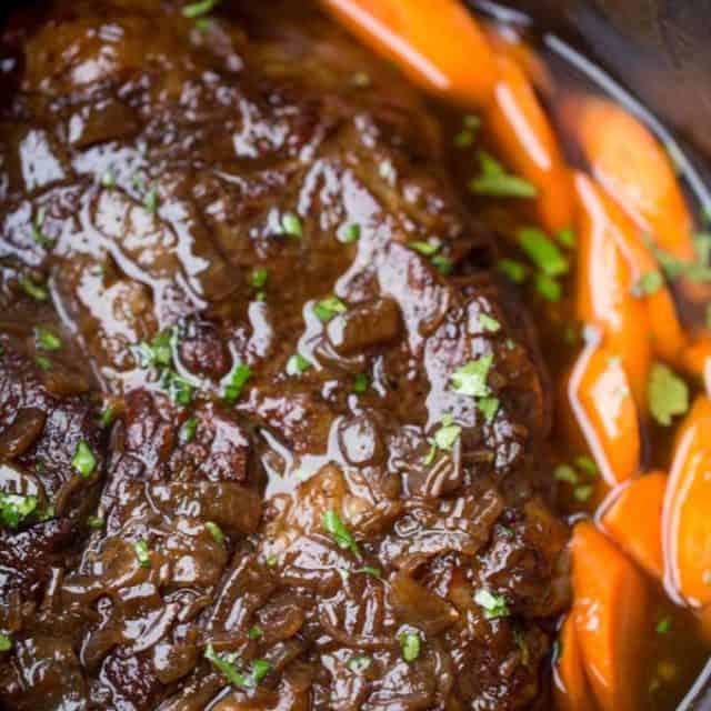Crockpot Balsamic Pot Roast with a rich balsamic gravy and carrots and potatoes.