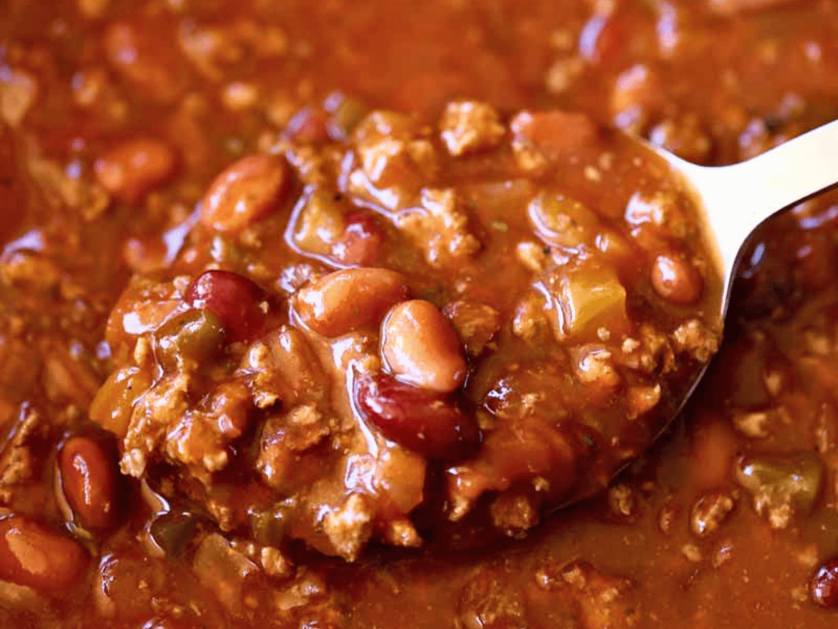 Close up of cooked chili on serving spoom