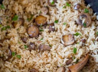 One Pot Mushroom Rice: The best, most buttery and mushroom-y rice you'll ever make. A PERFECT holiday side dish.