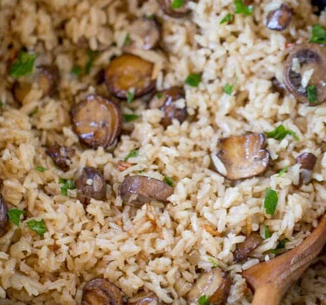 One Pot Mushroom Rice: The best, most buttery and mushroom-y rice you'll ever make. A PERFECT holiday side dish.