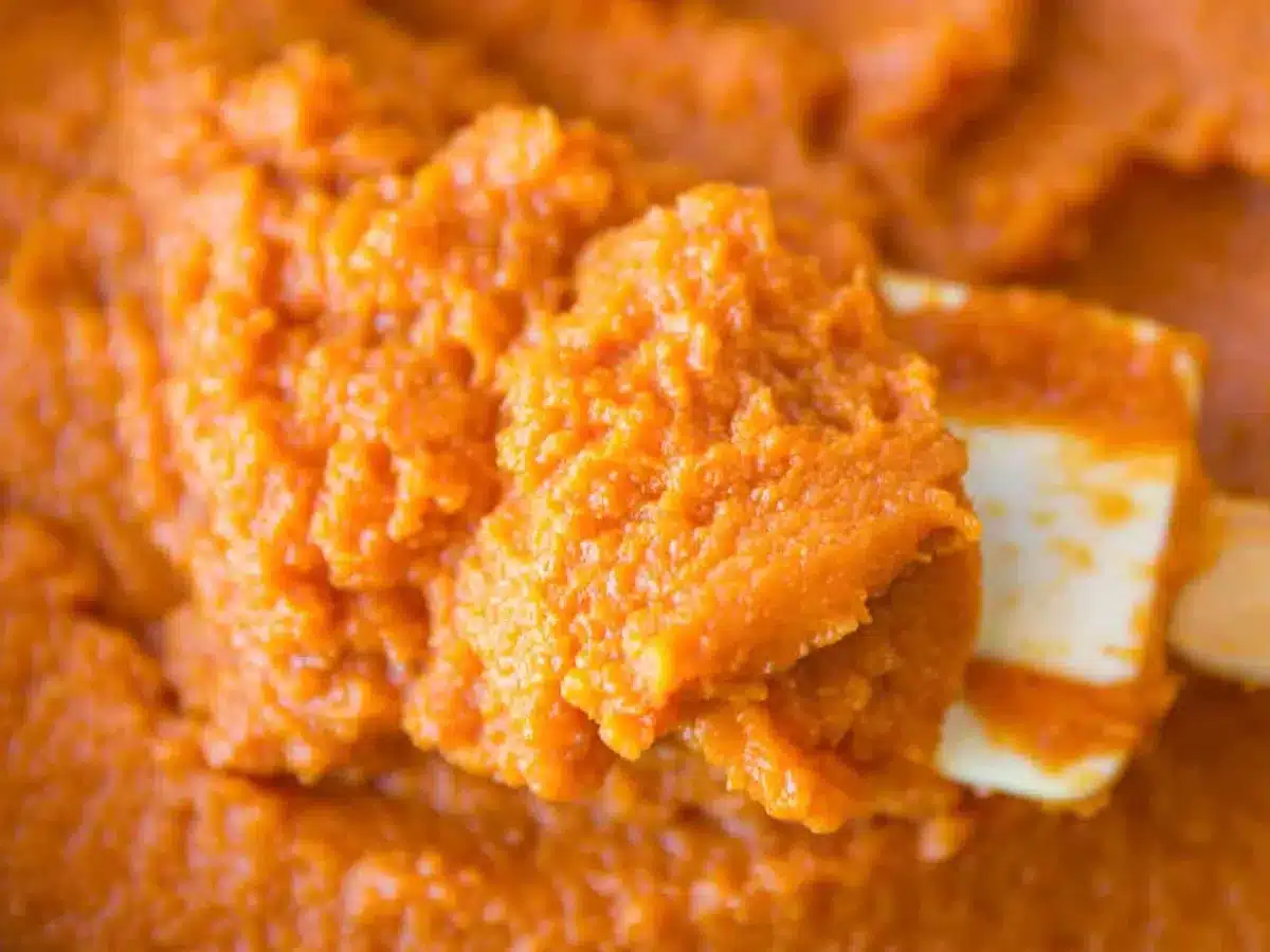 Close up of puree on spatula in bowl