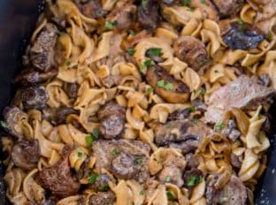 crockpot stroganoff with tender beef chunks and egg noodles
