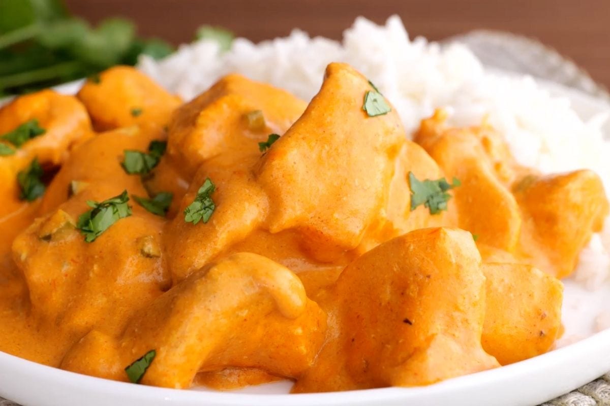 Slow Cooker Indian Butter Chicken on plate with rice
