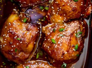Slow Cooker Mongolian Chicken is a set it and forget it five ingredient recipe that is sweet, spicy, and full of garlic and ginger flavors!