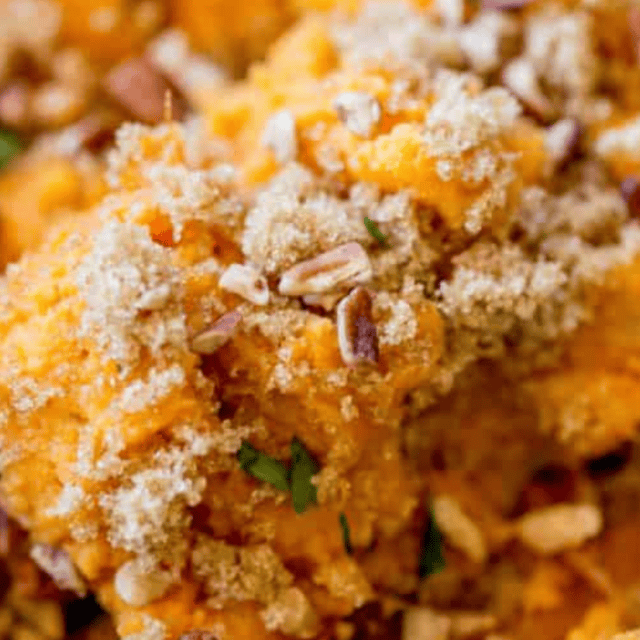 Close up of casserole being scooped out