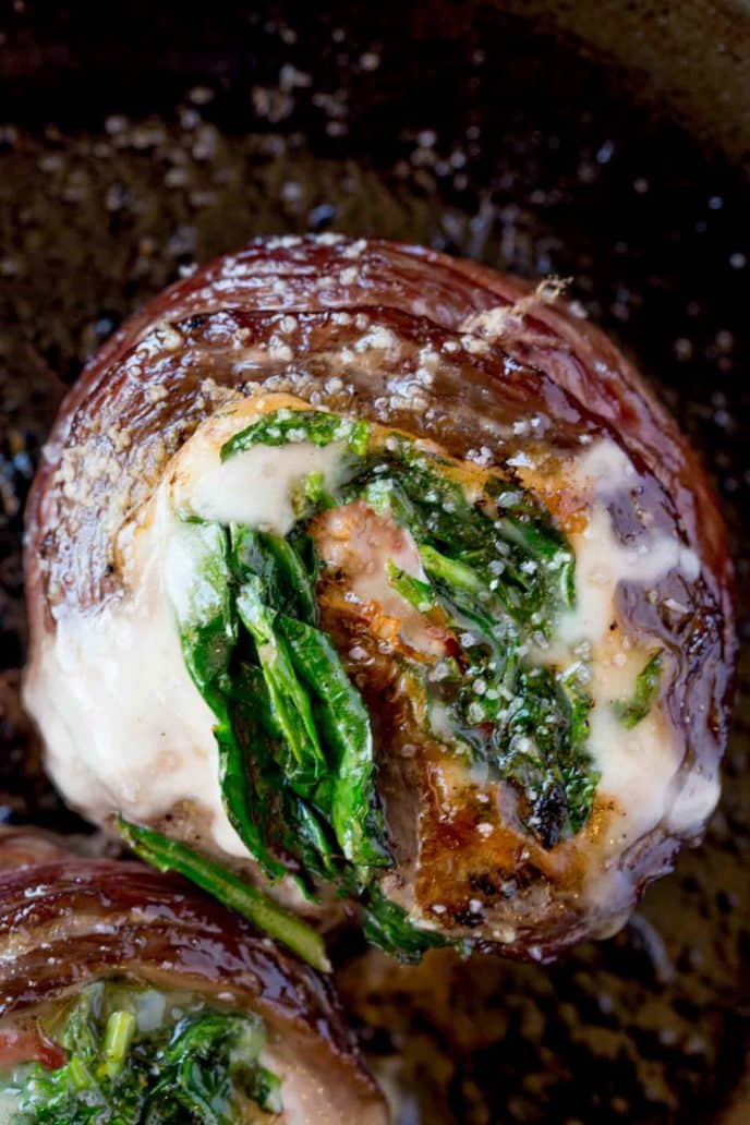 Spinach Artichoke Stuffed Flank Steak is a show stopping dish with provolone, spinach and artichokes that is dinner party ready in half an hour.