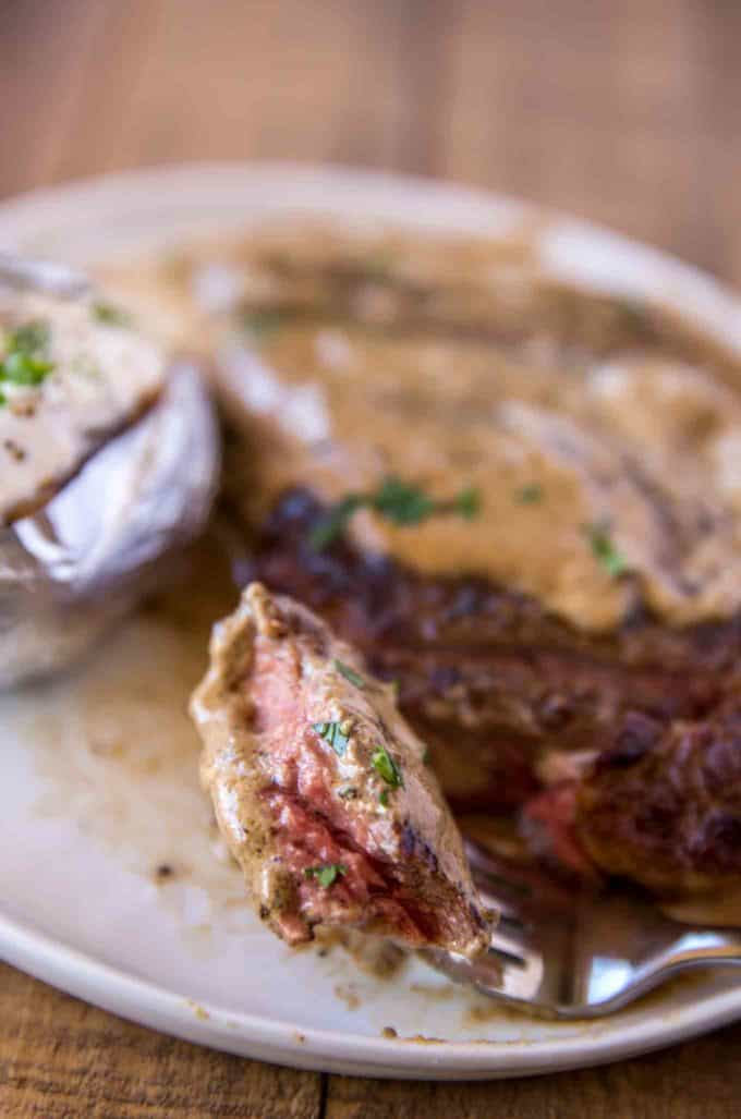 Steak Diane with creamy brandy sauce with peppercorns.