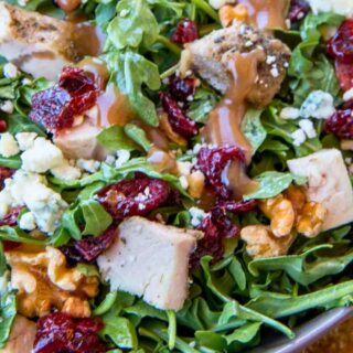 Finished green salad with turkey and cranberries