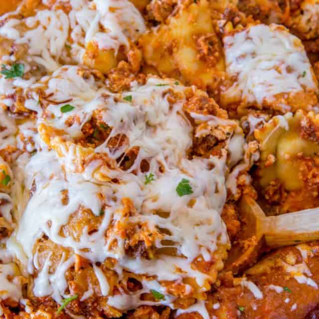 Easy Ravioli Lasagna Bake with three cheeses and ground beef is an easy weeknight meal you can prep ahead that tastes like lasagna with half the effort!
