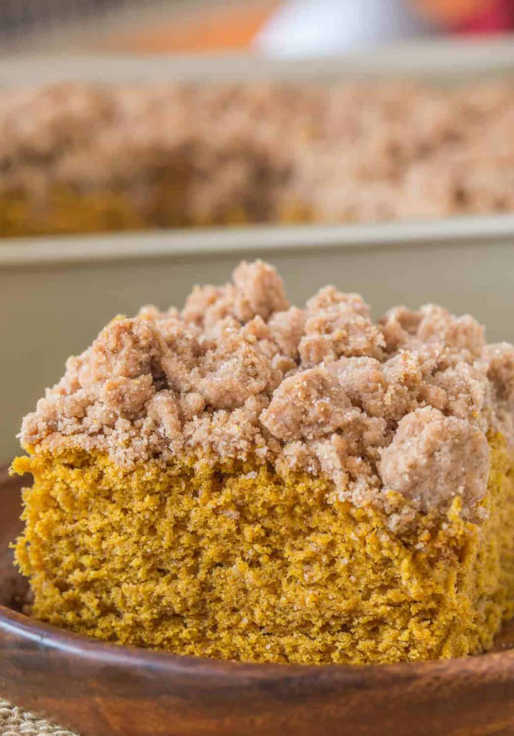 Pumpkin Crumb Cake on wooden bowl