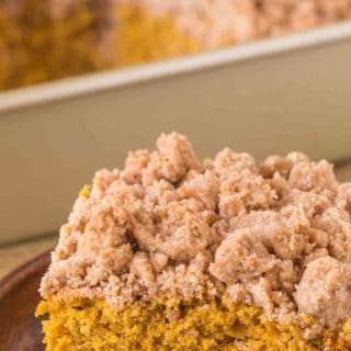 Pumpkin Crumb Cake with a New York Bakery Style giant brown sugar crumble topping is a fall bakery treat you'll enjoy for breakfasts all winter long.