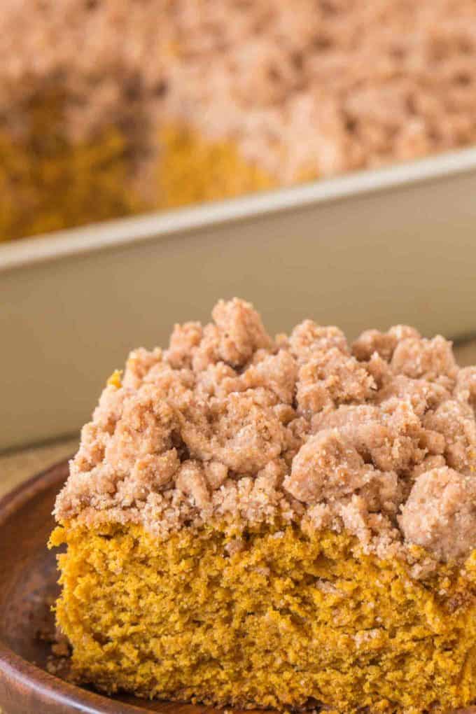 Pumpkin Crumb Cake with a New York Bakery Style giant brown sugar crumble topping is a fall bakery treat you'll enjoy for breakfasts all winter long.