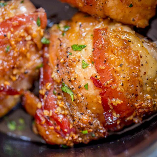 Crock Pot Bacon Brown Sugar Garlic Chicken is made with just five ingredients in your slow cooker. Sticky, garlicky, sweet fall apart bacon and chicken goodness.