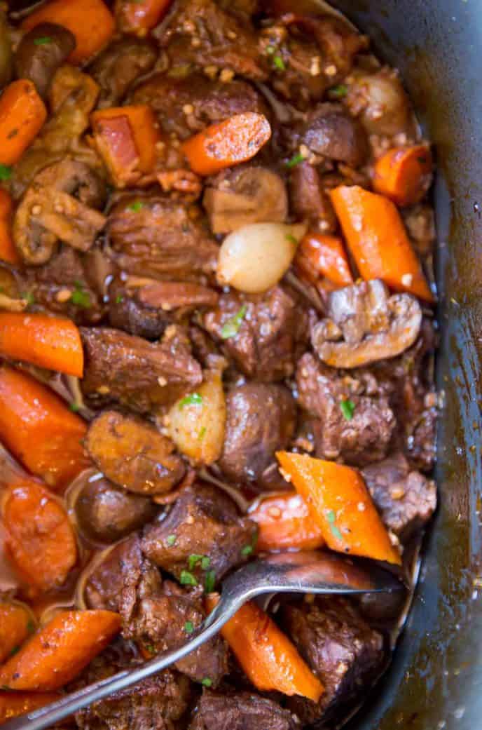 Slow Cooker Beef Bourguignon ready to cook in just 20 minutes and done when you get home from work. The perfect comfort food!