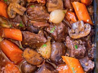 The EASIEST Slow Cooker Beef Bourguignon with all the delicious classic French flavors at a fraction of the work! An easy WEEKNIGHT meal.