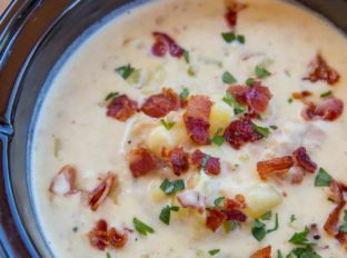 Slow Cooker Clam Chowder is so easy to make with a deliciously creamy, briny flavor mixed with smoky crispy bits of bacon and rich buttery yukon potatoes.