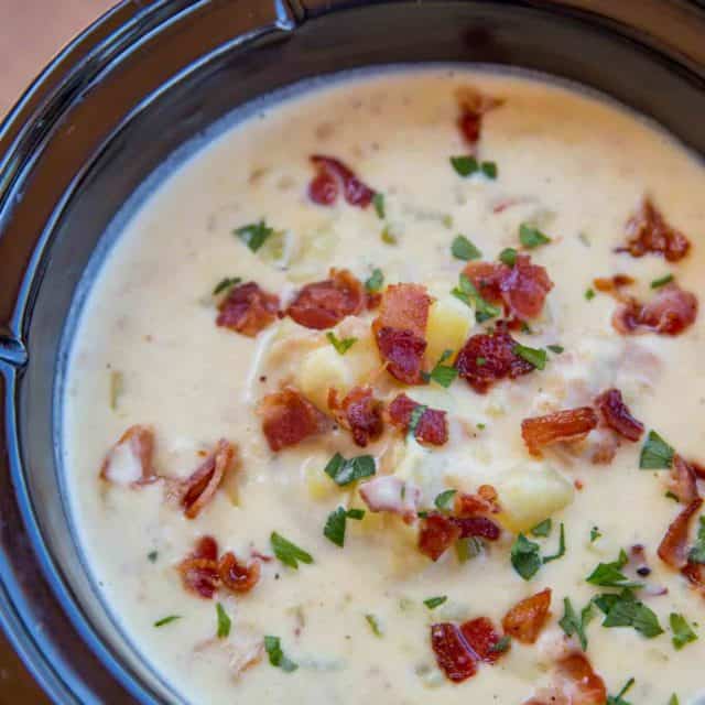 Slow Cooker Clam Chowder is so easy to make with a deliciously creamy, briny flavor mixed with smoky crispy bits of bacon and rich buttery yukon potatoes.