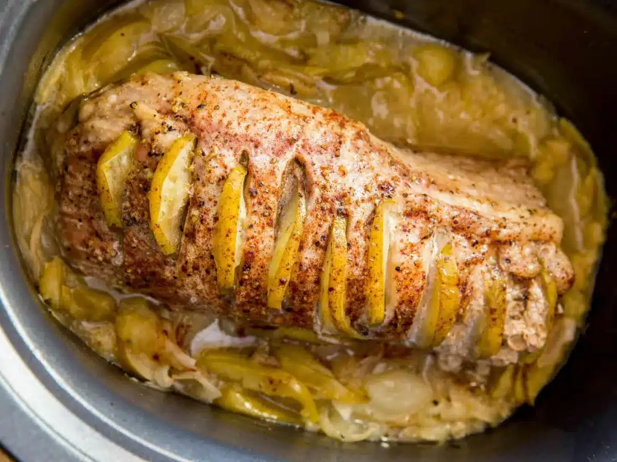 pork slow cooking in a crock pot 