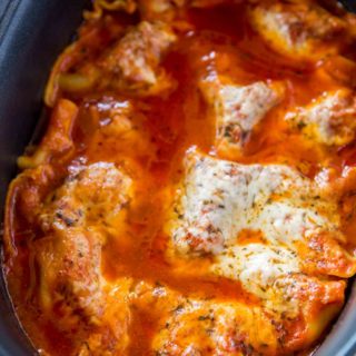 Slow Cooker Lasagna made with lasagna noodles, beef, mozzarella, ricotta and Parmesan cheese is the ultimate comfort food in just 20 minutes of prep time.