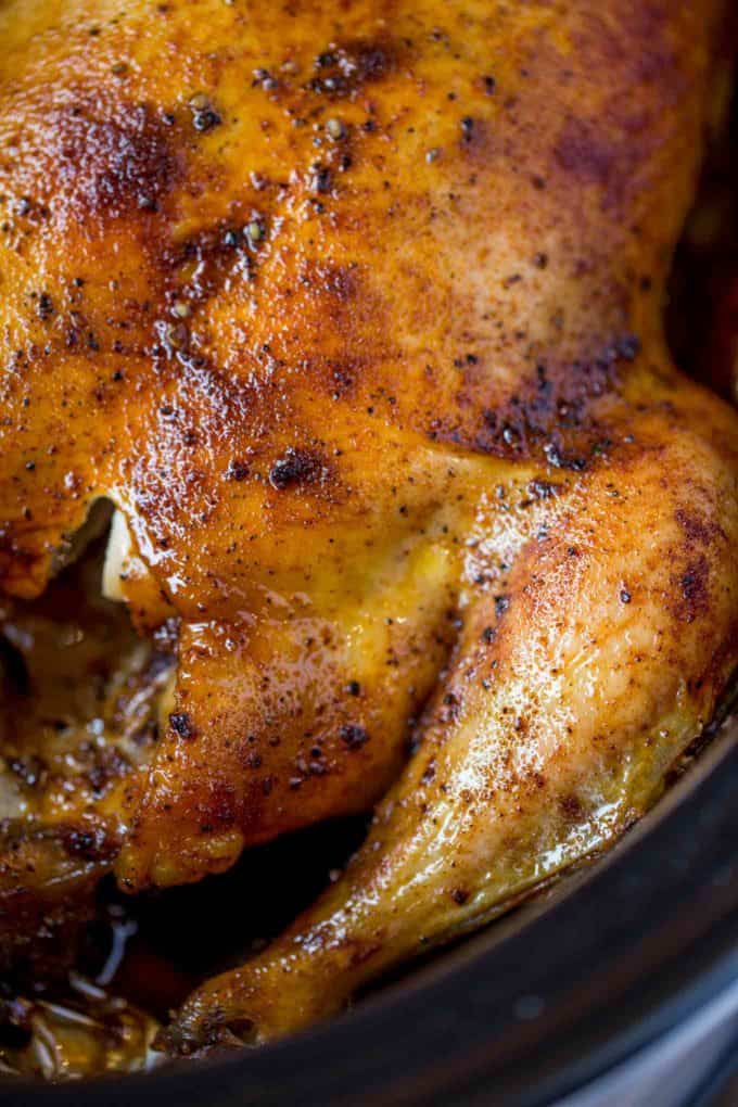 The easiest rotisserie chicken you'll ever make. Crispy Rotisserie chicken in the slow cooker.