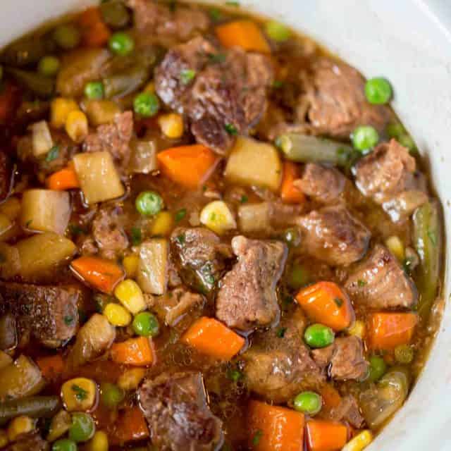 The BEST Slow Cooker Beef and Vegetable Soup you'll ever eat and so easy to make!