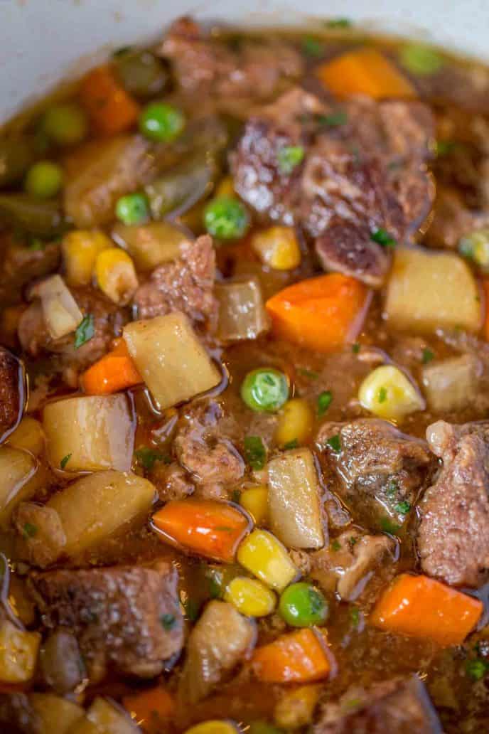 https://dinnerthendessert.com/wp-content/uploads/2017/11/Slow-Cooker-Vegetable-Beef-Soup-2-1-688x1032.jpg