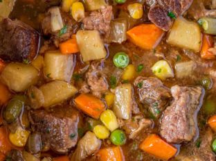 Slow Cooker Vegetable Beef Soup with is the most comforting, EASY soup you'll make. You'll want to dip crusty bread into the amazing flavors in this soup!