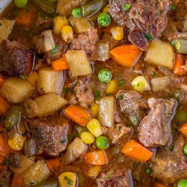 Slow Cooker Vegetable Beef Soup with is the most comforting, EASY soup you'll make. You'll want to dip crusty bread into the amazing flavors in this soup!