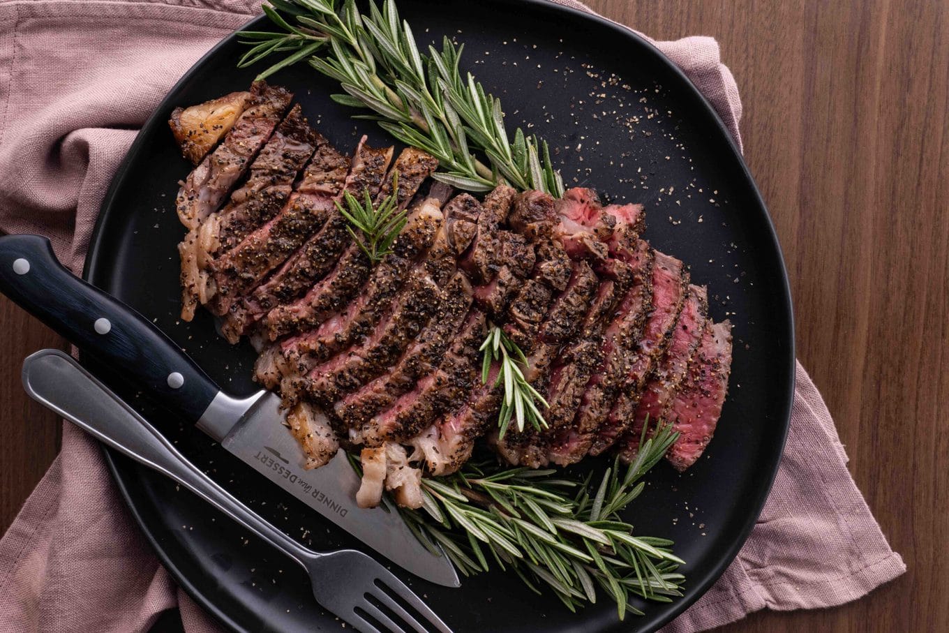 Ribeye Steak sliced on serving platter