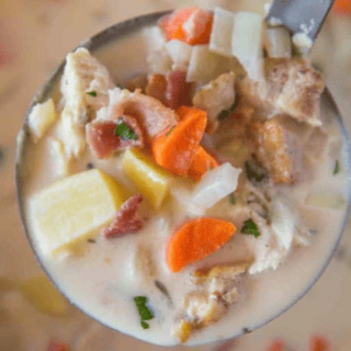 chowder in a ladle over crockpot