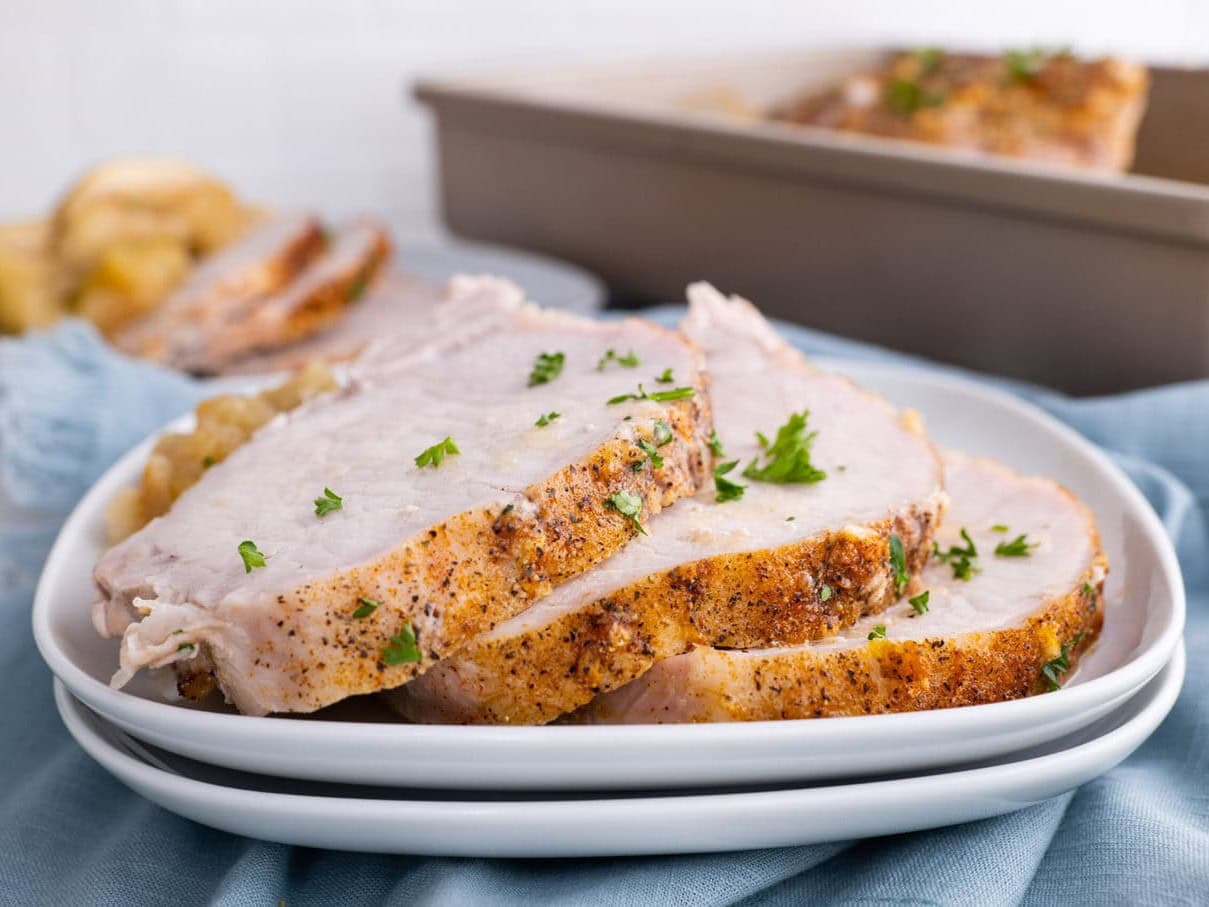 Sliced Pork loin on white plates