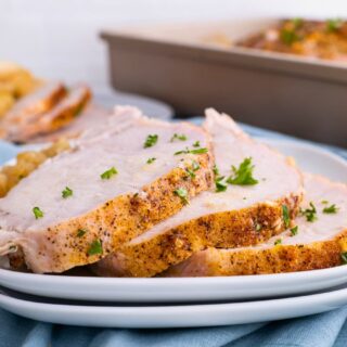 Sliced Pork loin on white plates