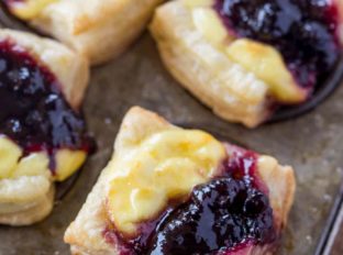 Blueberry Vanilla Goat Cheese Pastry Bites with just five ingredients are the easiest appetizers you'll ever serve your guests. Perfect for the holidays!