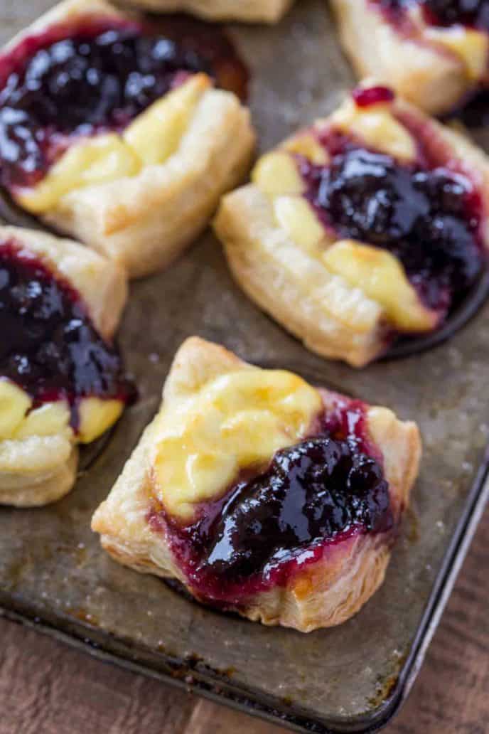 Blueberry Vanilla Goat Cheese Pastry Bites with just five ingredients are the easiest appetizers you'll serve your guests. Prep ahead of time for parties.