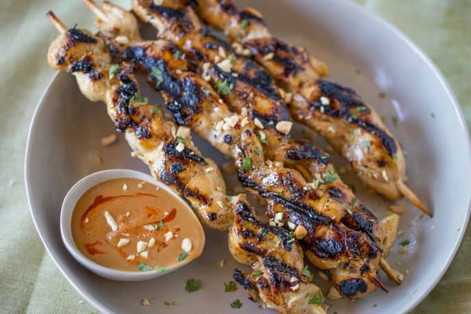 Delicious, authentic chicken satay with a creamy dipping sauce.