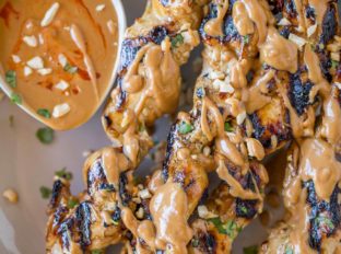Chicken Satay skewers with the easiest peanut sauce is both authentic and approachable for kids too! So delicious you'll skip the Thai food delivery!