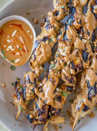 Chicken Satay skewers with the easiest peanut sauce is both authentic and approachable for kids too! So delicious you'll skip the Thai food delivery!