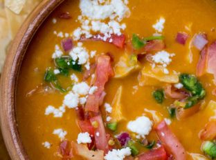 Chili's Chicken Enchilada Soup copycat is creamy, rich, slightly spicy and thick blended together and topped with chunks of chicken breast meat.