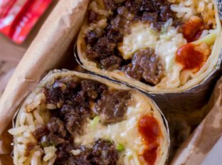 Mongolian Beef Burrito made with ground Mongolian beef, seasoned rice, Sriracha and a quick Asian mayo slaw. It's the best burrito you've had since Kogi bbq came on the scene.