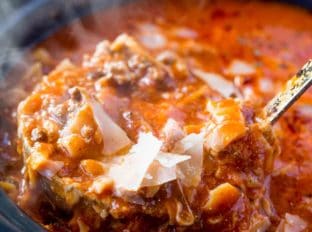 Slow Cooker Lasagna Soup with all the classic flavors of lasagna with all the warming flavors of soup. Just set it and forget it, serve with garlic bread!