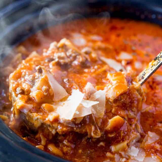 Slow Cooker Lasagna Soup with all the classic flavors of lasagna with all the warming flavors of soup. Just set it and forget it, serve with garlic bread!