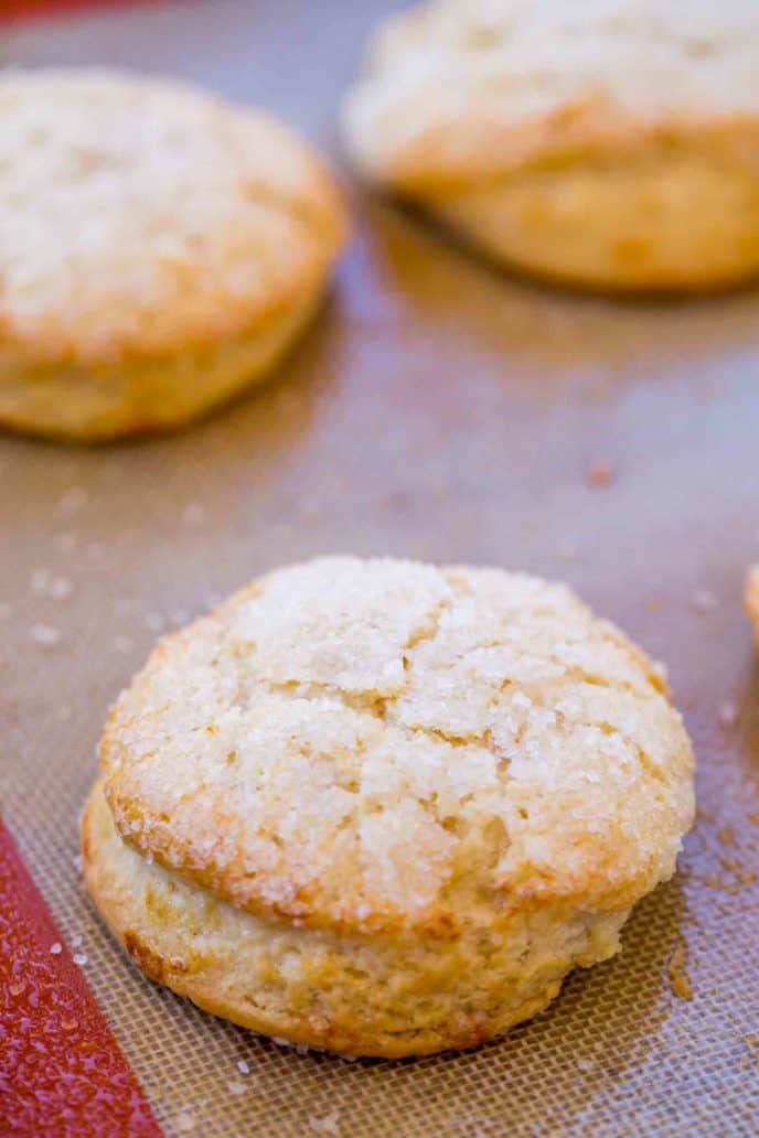 Sweet biscuits on baking sheet