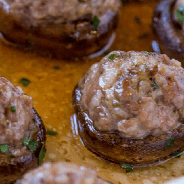 Closeup of mushrooms in juice