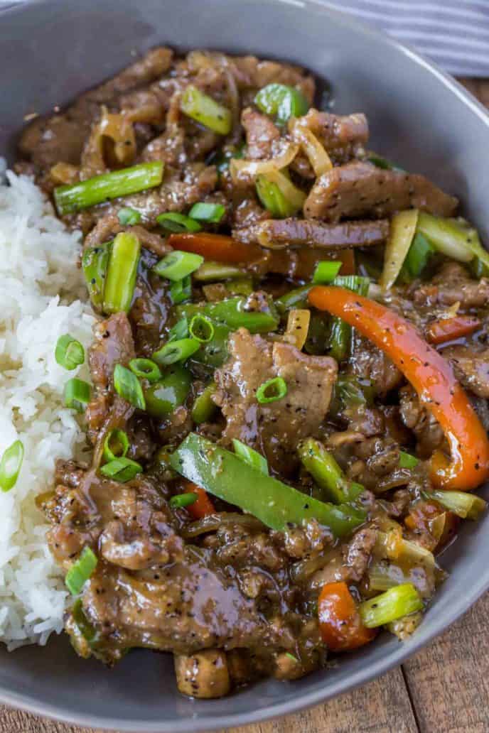 Chinese Pepper Steak in bowl with rice