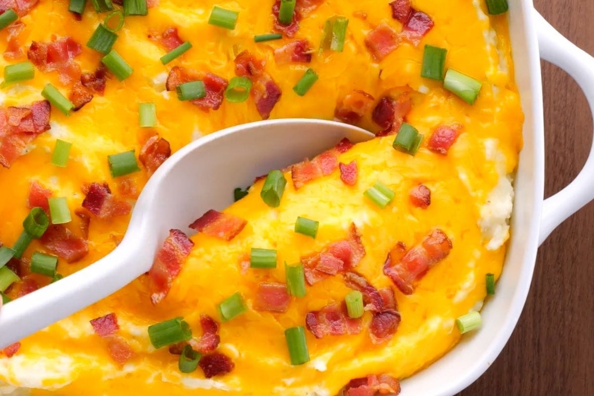 Loaded Mashed Potatoes with spoon.