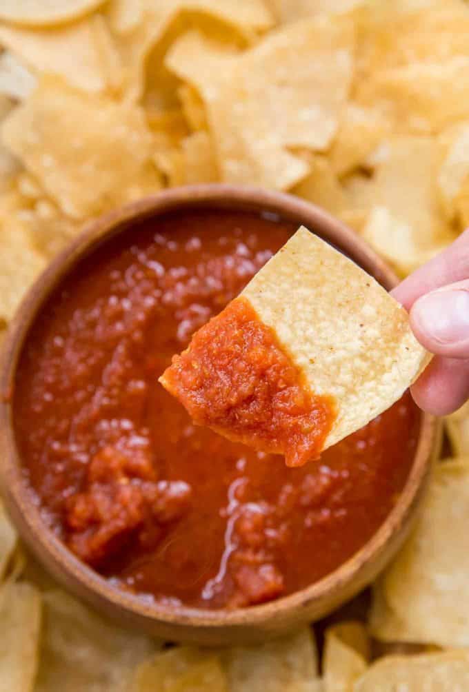 chips and salsa in wooden bowl