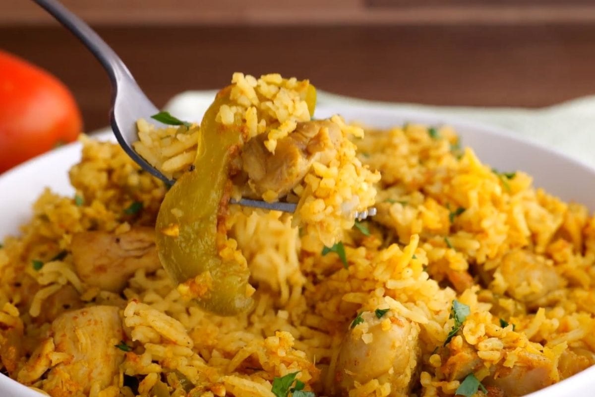 Chicken Biryani in bowl with fork